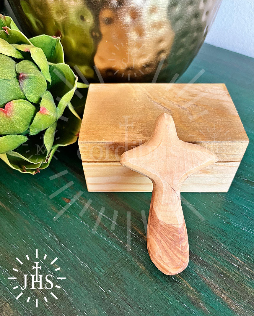 Cruz de mano